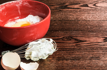 baking background with raw eggs and flour