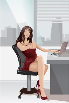 A brunette woman works at a desk.