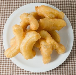 Delicious Deep Fried Doughstick on A White Dish