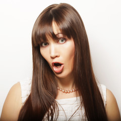 Fototapeta premium Beautiful young surprised woman.