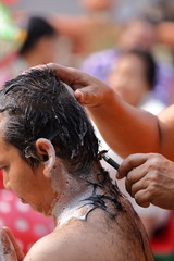 Male who will be monk shaving hair for be Ordained