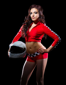 Young girl in red racing costume