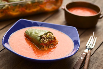 Hungarian stuffed baked pepper with tomato sauce