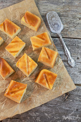 pieces of cake on a wooden board