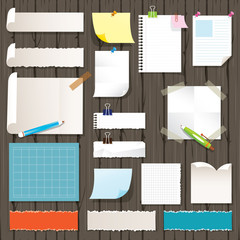Various Kind of Paper Objects on Wood Background