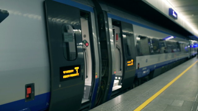 Businesswoman running late for the train, steadycam shot
