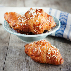 Fresh croissants on a table