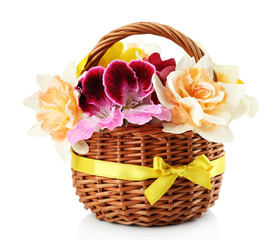 Fototapeta na wymiar Beautiful flowers in basket isolated on white