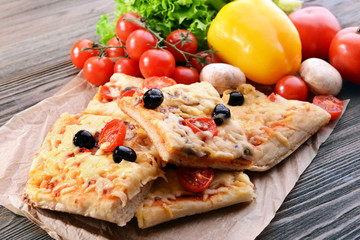 Delicious homemade pizza on table close-up