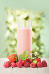 glass of smoothie in the garden