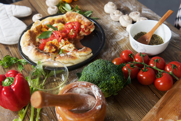 Home made margarita pizza on table