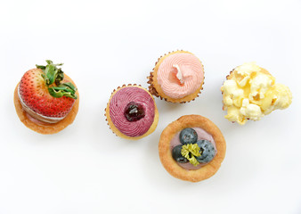 fruit tarts on white background (top view)