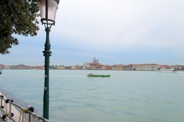 Fototapeta na wymiar View of Giudecca channel with street lamp, Venice