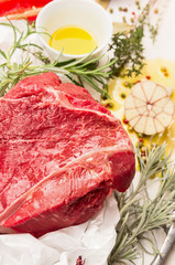 raw beef fillet preparation with fresh seasoning