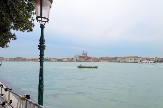 View of Giudecca channel with street lamp, Venice