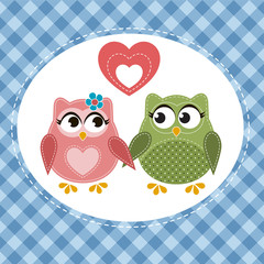 Two cute owls in love