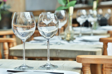 Table setting with wine glasses at the vintage cafe.