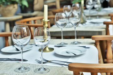 Table setting with wine glasses at the vintage cafe.
