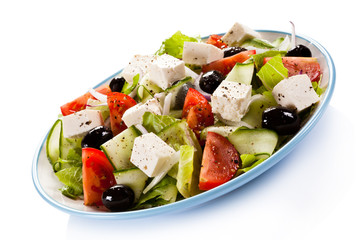 Greek salad on white background