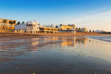Caleta  Beach in sunny sunrise © JackF