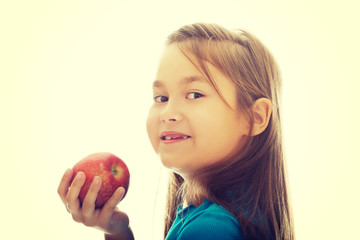 Fototapeta na wymiar Girl holding an apple