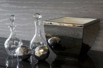 Obraz na płótnie Canvas glass carafe and silver bowl
