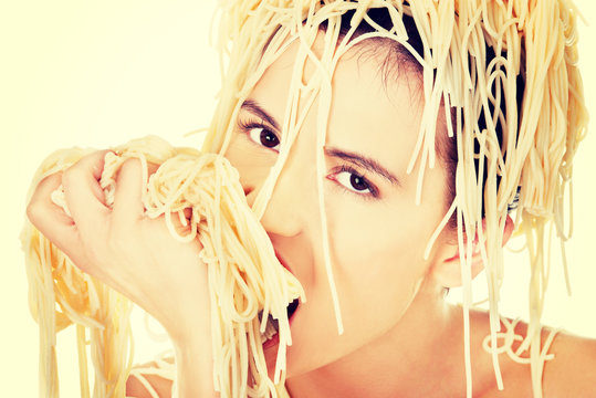 Young Woman Eating Spaghetti