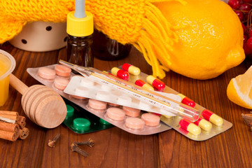 Close up of lemon and pills