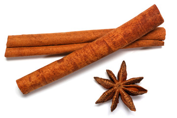 cinnamon stick and star anise spice on white background closeup
