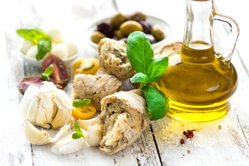 Bread and olive oil with snacks