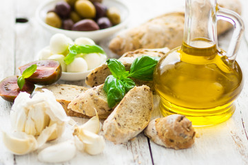 Bread and olive oil with snacks