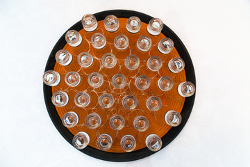 Crystal glasses on a plate isolated