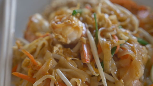 Pad Thai stir-fried noodles with shrimp, close up shot