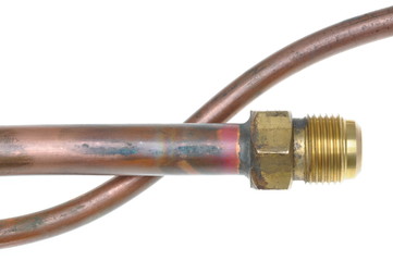 Copper water pipes isolated on white background