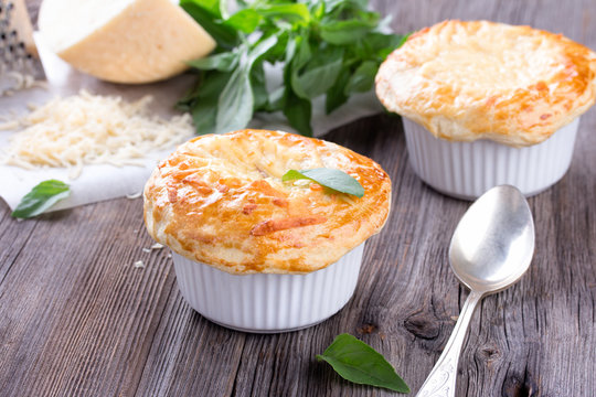Chicken pot pie with cheese and basil