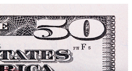 Number 50. Fragment of $50 banknotes isolated on white.