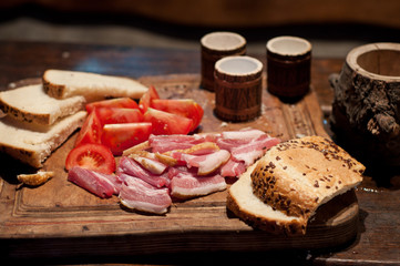 Bacon, tomato, bread and moonshine