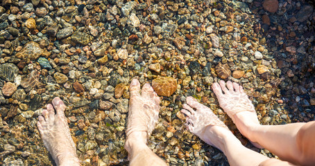 Feet in cold water