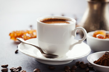 Fresh croissants  and cup of coffee on a table