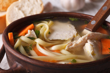 Homemade soup with noodles, chicken and vegetables 