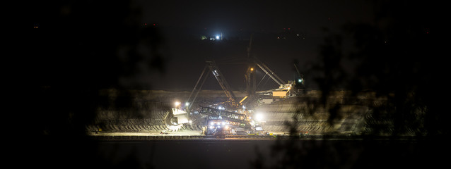 bucket-wheel excavator at night in open-cast coal mining hambach