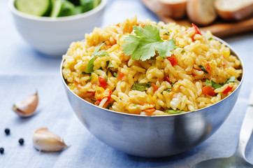 saffron rice with vegetables and cilantro