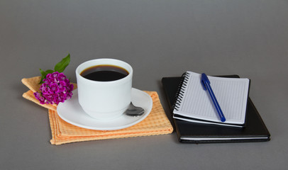 Cup of coffee with a saucer