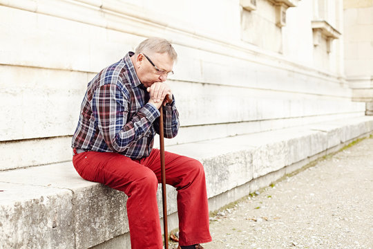 Elderly man thinking outdoor
