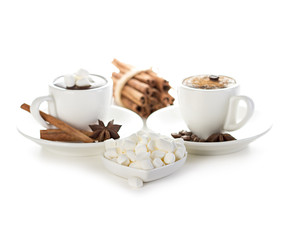 Marshmallow with two cups of hot chocolate isolated