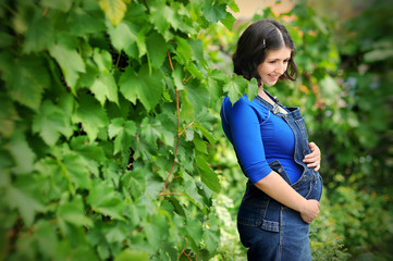 Нappiness beautiful pregnant young woman