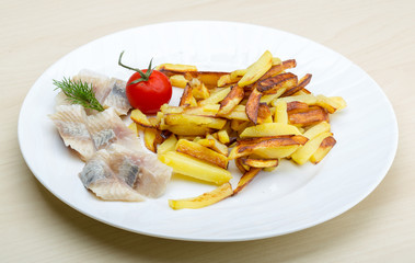 Roasted potato with herring fillet