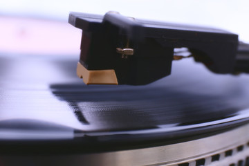 Fototapeta na wymiar Gramophone with a vinyl record, closeup