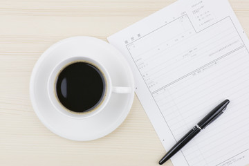 履歴書とコーヒー