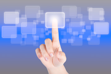 Hand pressing button with technology background